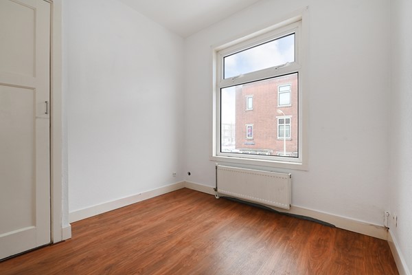 Medium property photo - Jan ten Brinkstraat 147, 2522 HX Den Haag